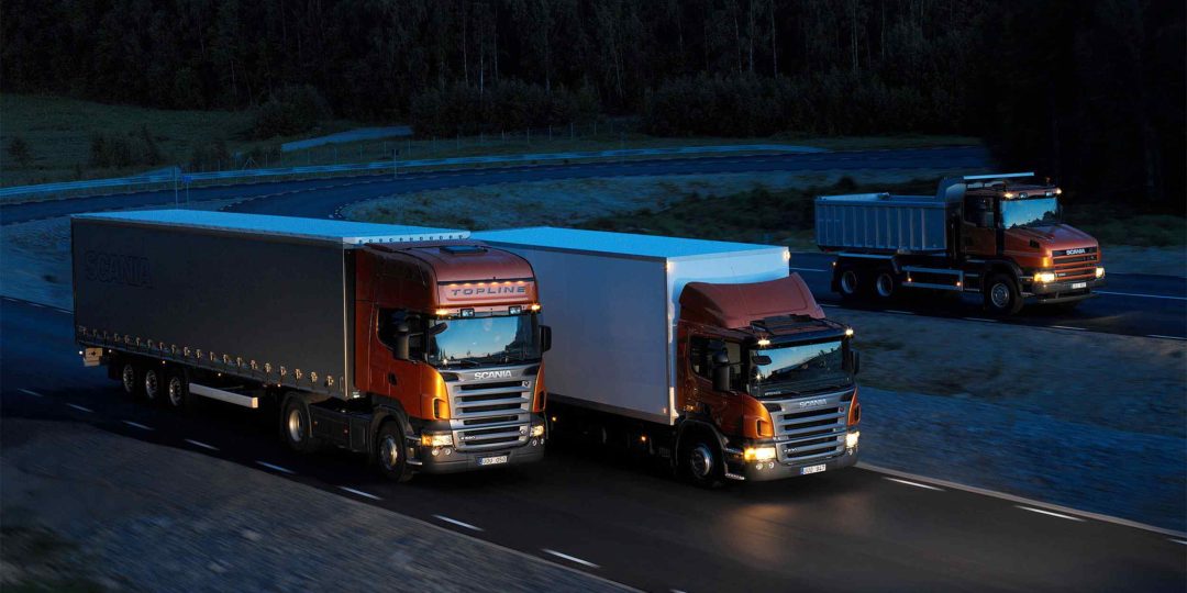 Three-orange-Scania-trucks-1080x540.jpg